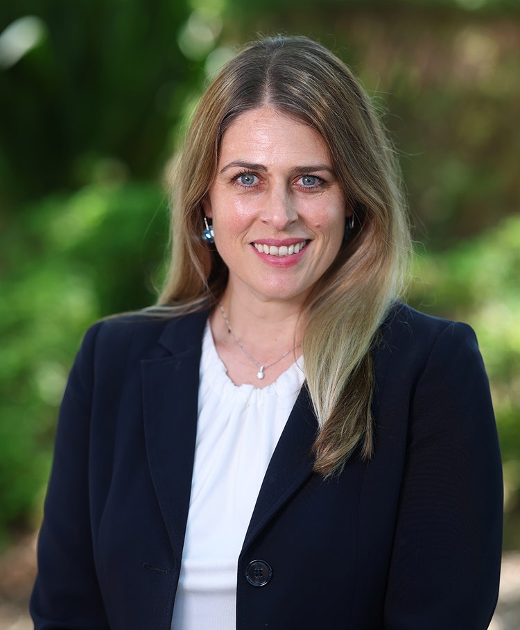 Portrait of our smiling Principal.