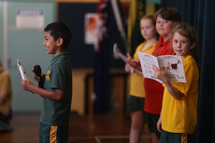 Students in a year 3 class presenting a readers theatre play to their classmates.
